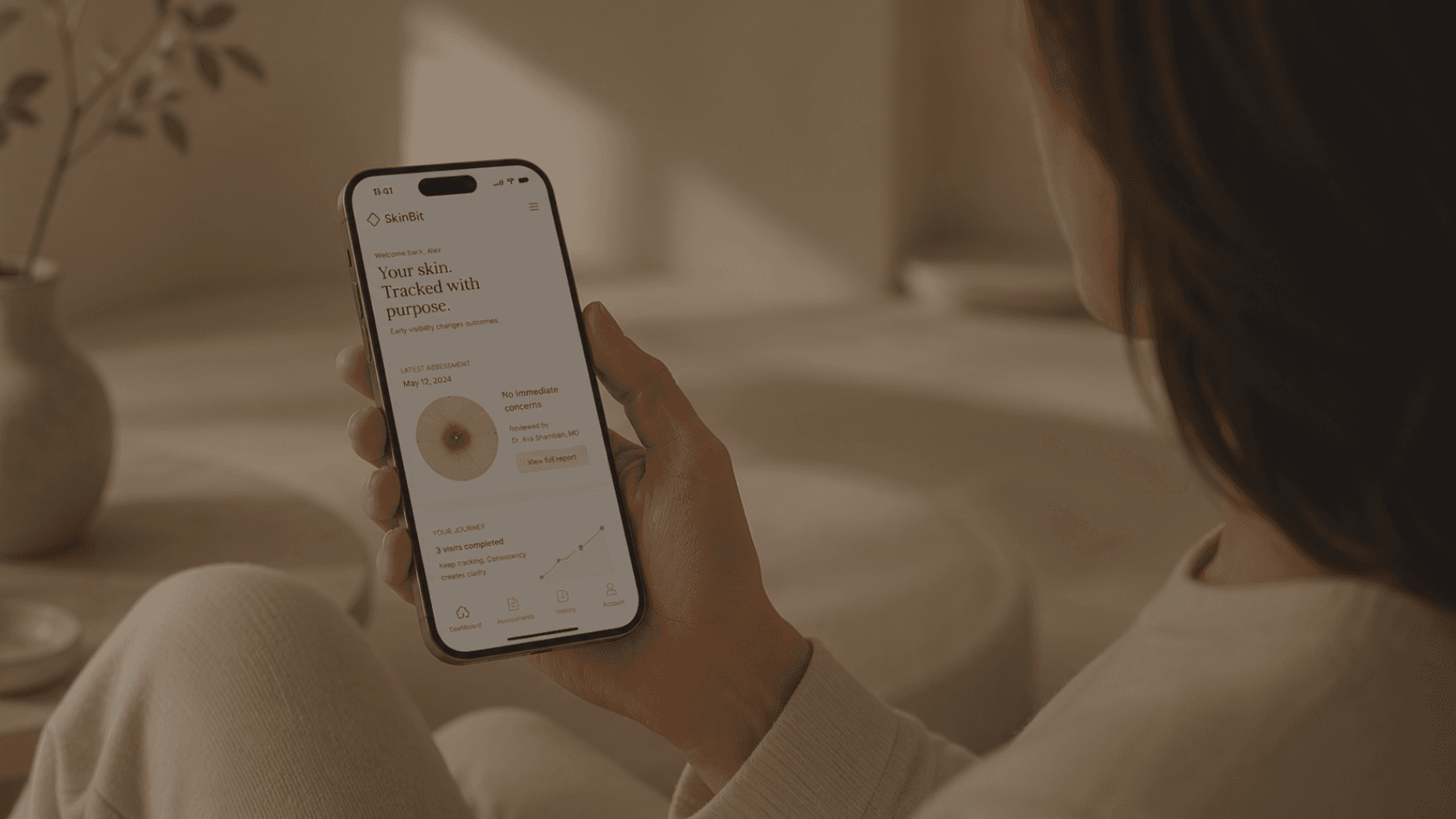 A member accessing SkinBit from her phone